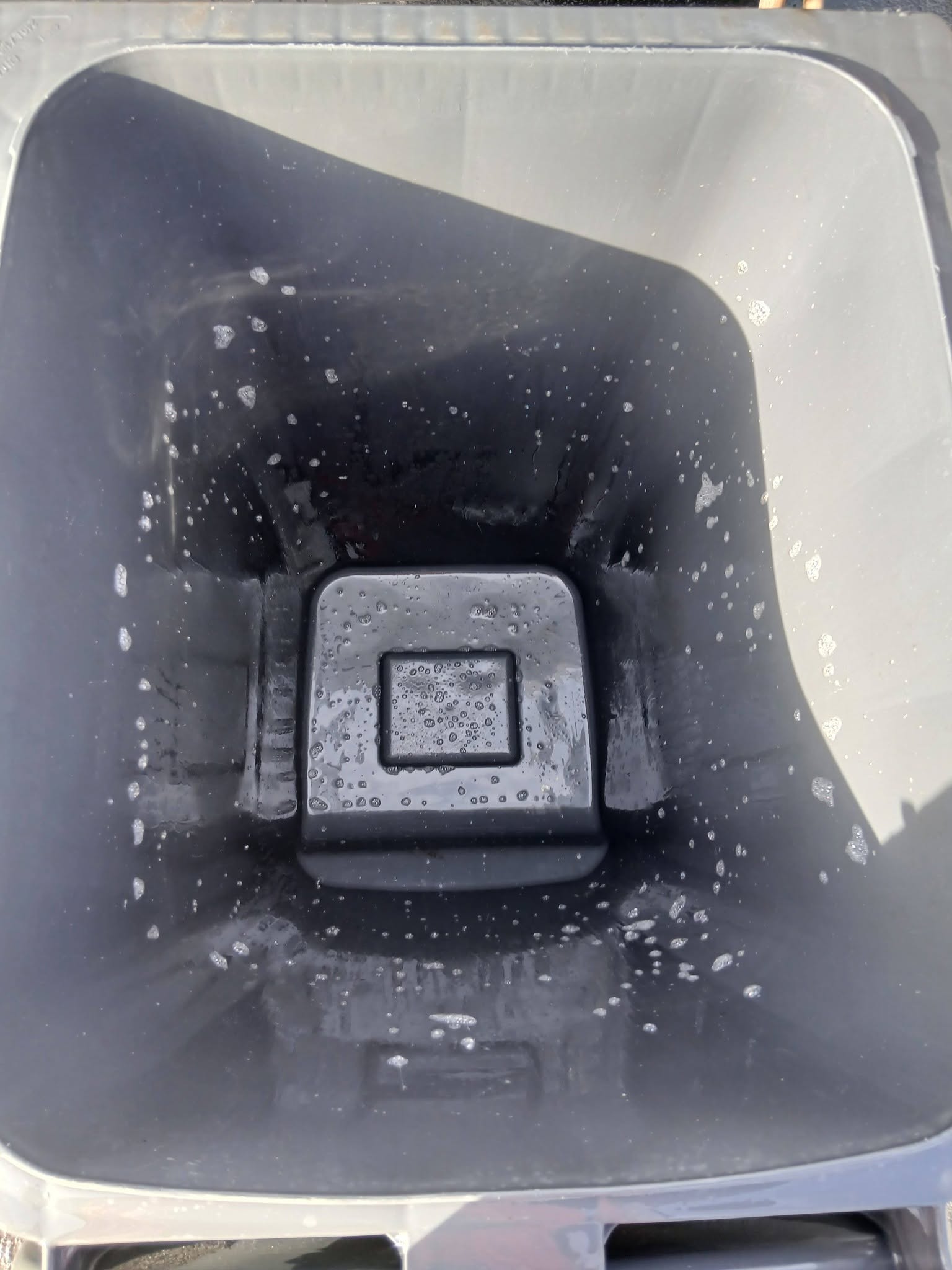 Same wheelie bin interior, clean after our jetwash