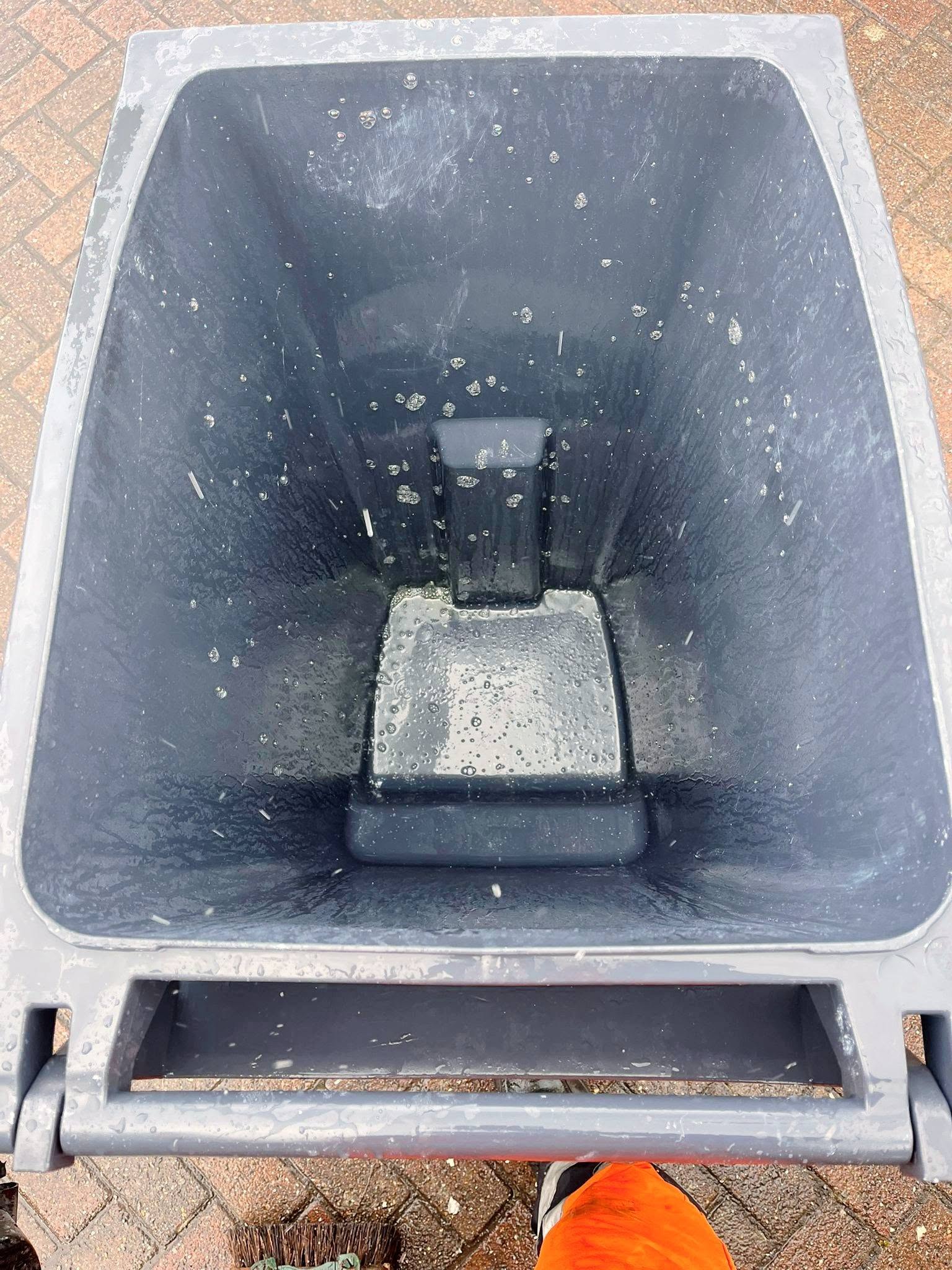 Same wheelie bin interior, sparkling after cleaning